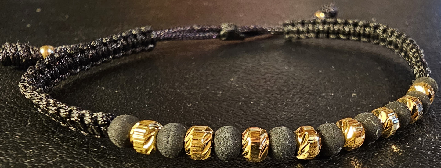 Pulsera trenzada con balines en oro laminado