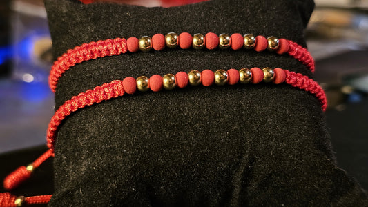 Pulsera trenzada con balines en oro laminado
